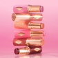 Unreal Lip + Cheek Glow Blush Stick with Hyaluronic Acid Charlotte Tilbury