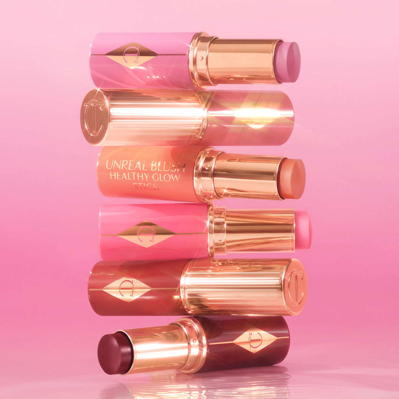 Unreal Lip + Cheek Glow Blush Stick with Hyaluronic Acid Charlotte Tilbury